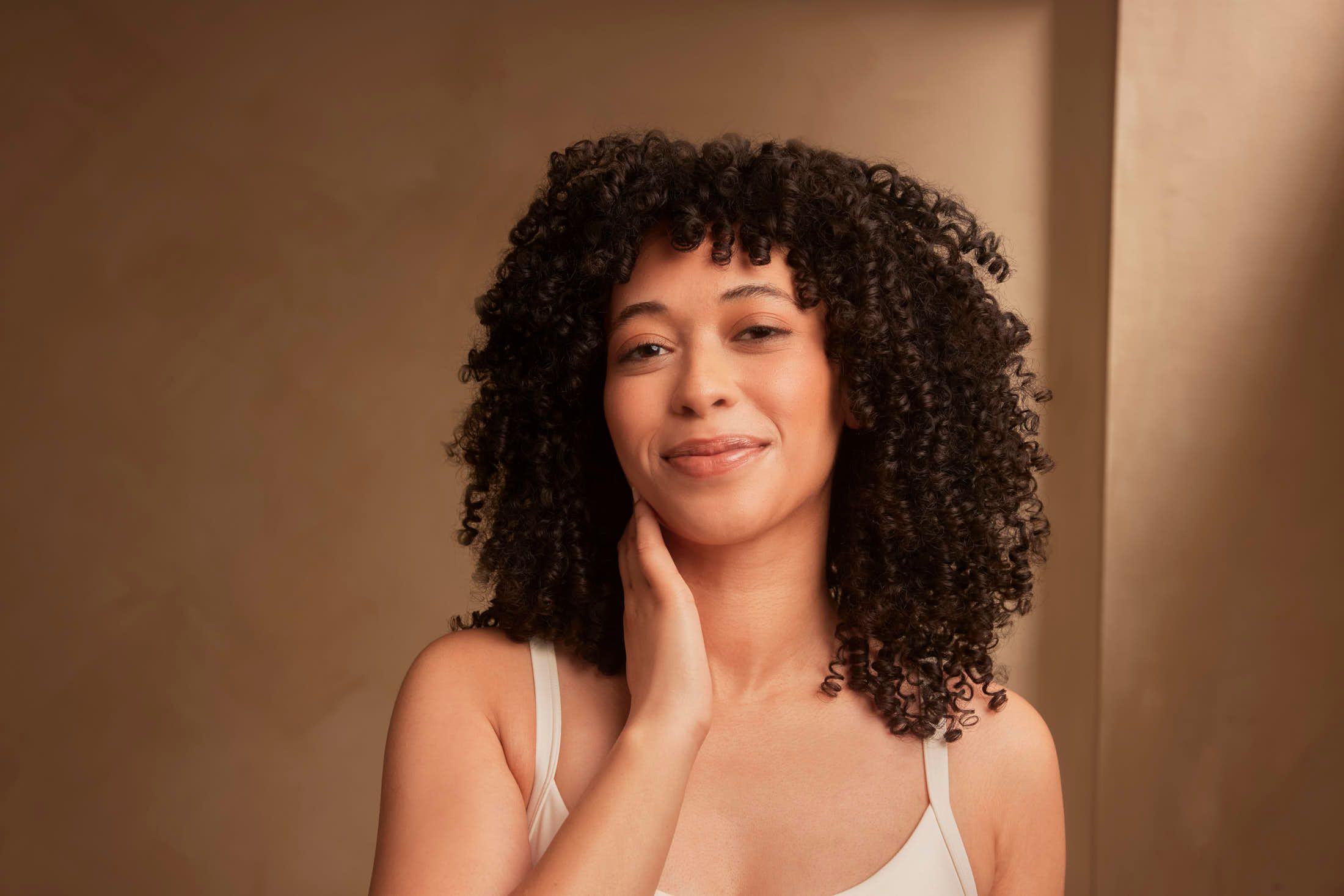 Client met stralende huid na botoxbehandeling tegen voorhoofdrimpels bij The Body Clinic