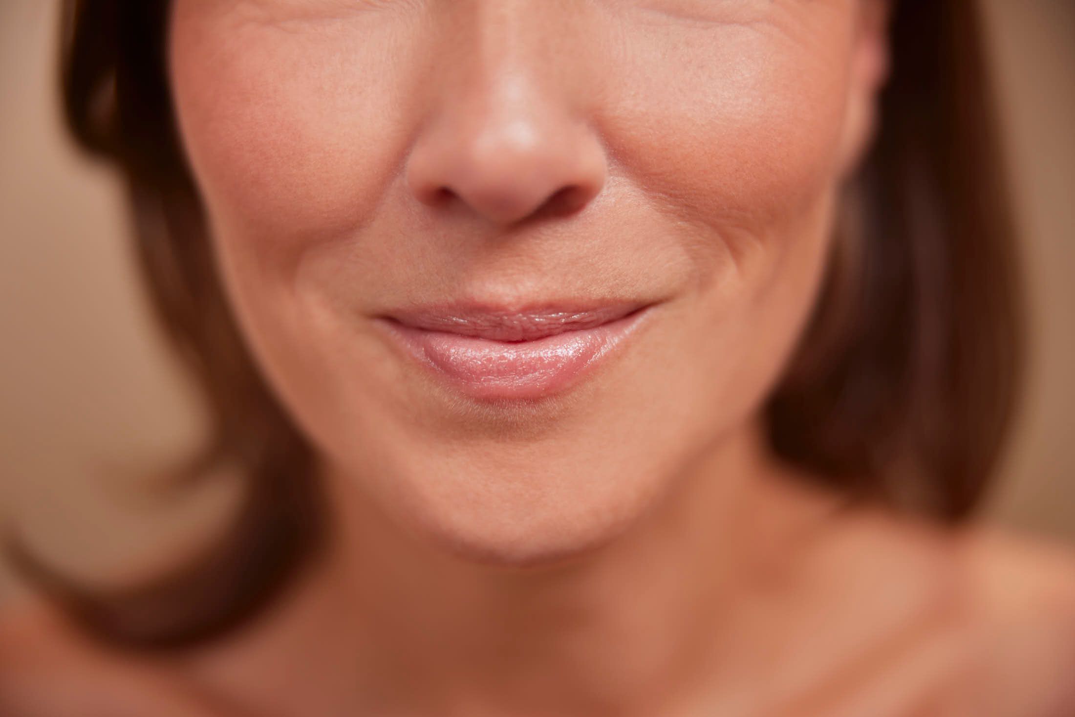 Close-up van gehydrateerde huid na Restylane Skinboosters behandeling bij The Body Clinic